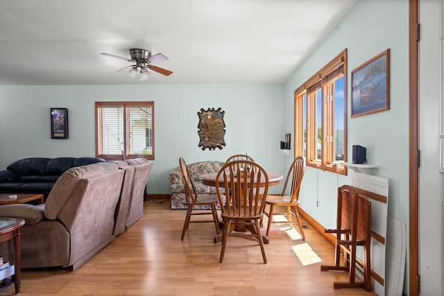 101 W Olive St, Colfax, IL 61728 - dining area featuring light wood-type flooring and a ceiling fan
