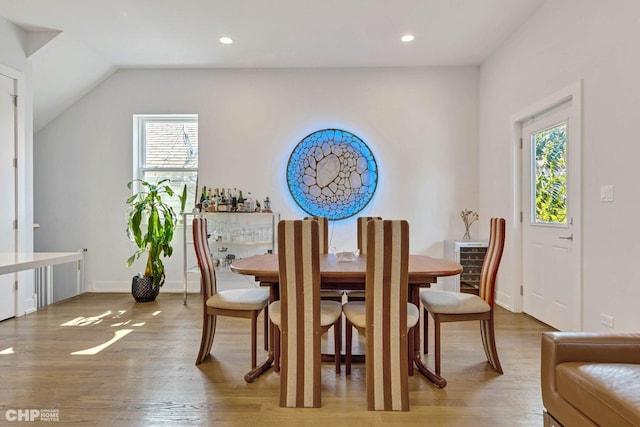1920 S Shelby Ct, Chicago, IL 60608 - dining space featuring light wood-style flooring, vaulted ceiling, and recessed lighting