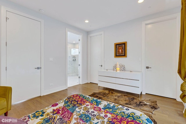 1920 S Shelby Ct, Chicago, IL 60608 - bedroom featuring recessed lighting, connected bathroom, and wood finished floors