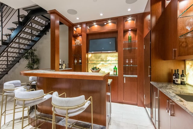 1401 N Astor St, Chicago, IL 60610 - community bar area with stairway, recessed lighting, and decorative backsplash