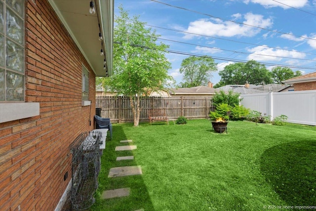 9122 S Avers Ave, Evergreen Park, IL 60805 - view of yard featuring an outdoor fire pit