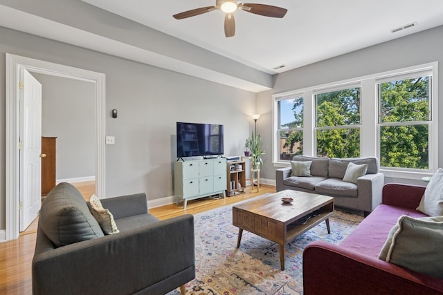 715 E 62nd St Unit 3, Chicago, IL 60637 - living room with a ceiling fan and light wood-style flooring