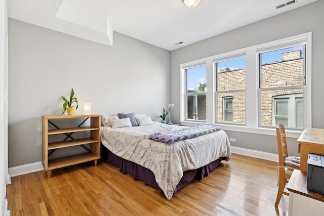 715 E 62nd St Unit 3, Chicago, IL 60637 - bedroom with light wood-type flooring and baseboards