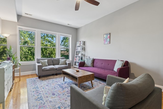 715 E 62nd St Unit 3, Chicago, IL 60637 - living room with ceiling fan and light wood-style flooring
