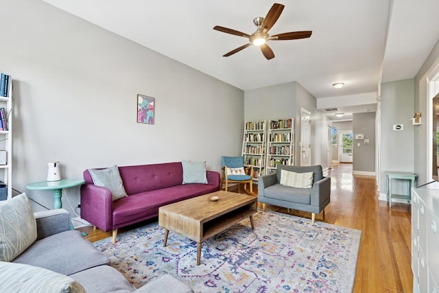 715 E 62nd St Unit 3, Chicago, IL 60637 - living room with ceiling fan and light wood finished floors