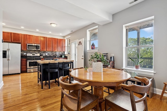 715 E 62nd St Unit 3, Chicago, IL 60637 - dining room with recessed lighting and light wood-style flooring