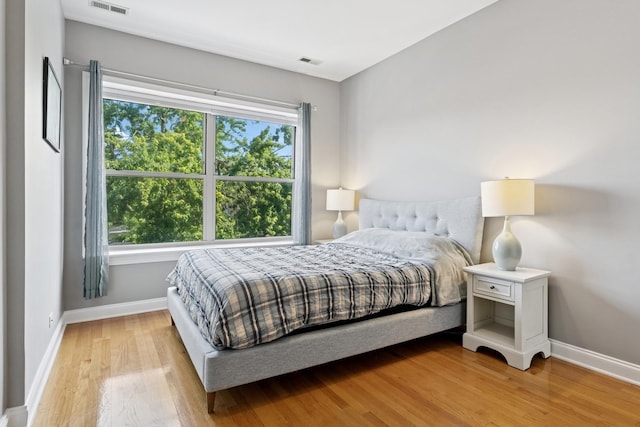 715 E 62nd St Unit 3, Chicago, IL 60637 - bedroom with wood finished floors and baseboards