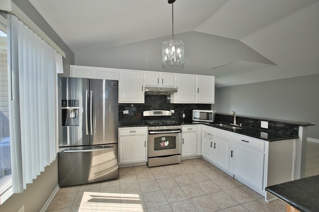 3108 141st St, Blue Island, IL 60406 - kitchen with stainless steel appliances, under cabinet range hood, lofted ceiling, tasteful backsplash, and white cabinetry
