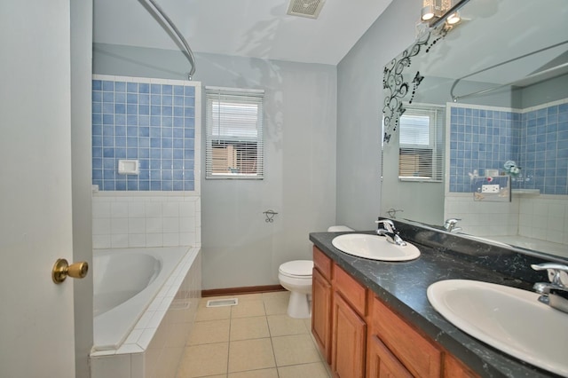3108 141st St, Blue Island, IL 60406 - bathroom featuring tile patterned flooring, double vanity, healthy amount of natural light, and tiled shower / bath