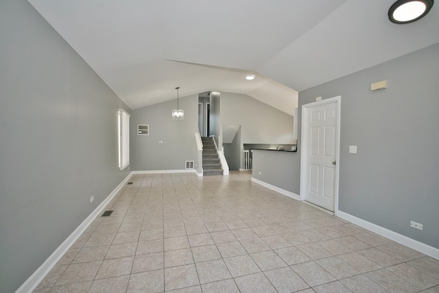 3108 141st St, Blue Island, IL 60406 - unfurnished living room with lofted ceiling, stairs, and light tile patterned floors