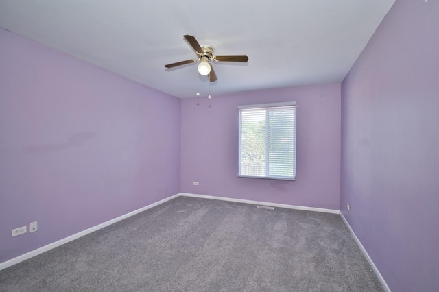 3108 141st St, Blue Island, IL 60406 - empty room with ceiling fan and carpet floors