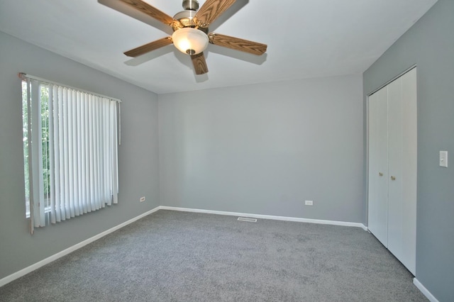 3108 141st St, Blue Island, IL 60406 - carpeted spare room with baseboards and a ceiling fan