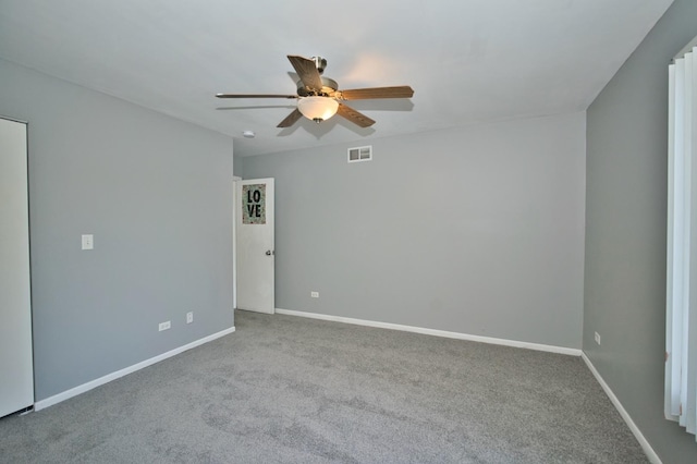 3108 141st St, Blue Island, IL 60406 - carpeted empty room with ceiling fan and baseboards