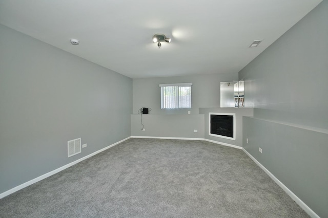 3108 141st St, Blue Island, IL 60406 - unfurnished living room featuring carpet floors and a fireplace