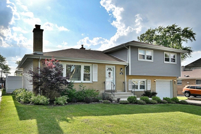 758 N Kenilworth Ave, Elmhurst, IL 60126 - split level home featuring brick siding, a garage, a front yard, and a chimney