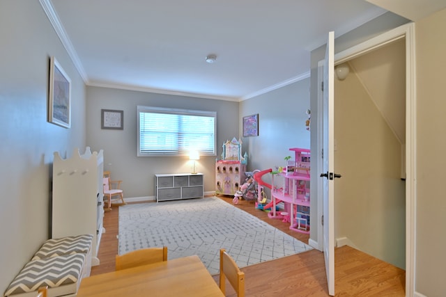 758 N Kenilworth Ave, Elmhurst, IL 60126 - game room with ornamental molding and wood finished floors