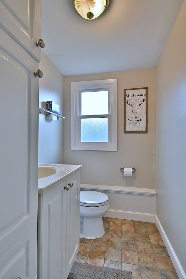 758 N Kenilworth Ave, Elmhurst, IL 60126 - half bathroom with vanity and stone finish floors