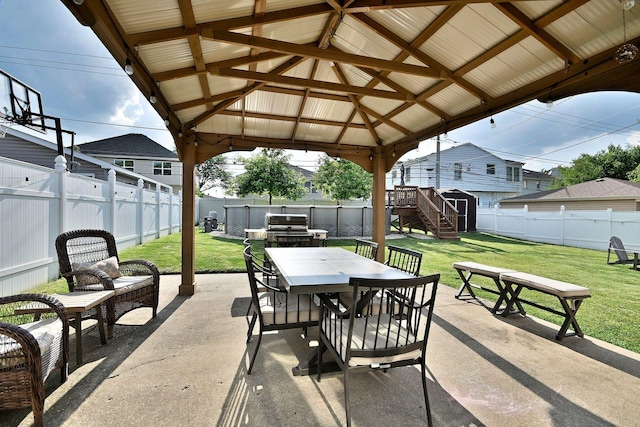 758 N Kenilworth Ave, Elmhurst, IL 60126 - fenced backyard featuring outdoor dining area, a patio, a gazebo, a grill, and a shed
