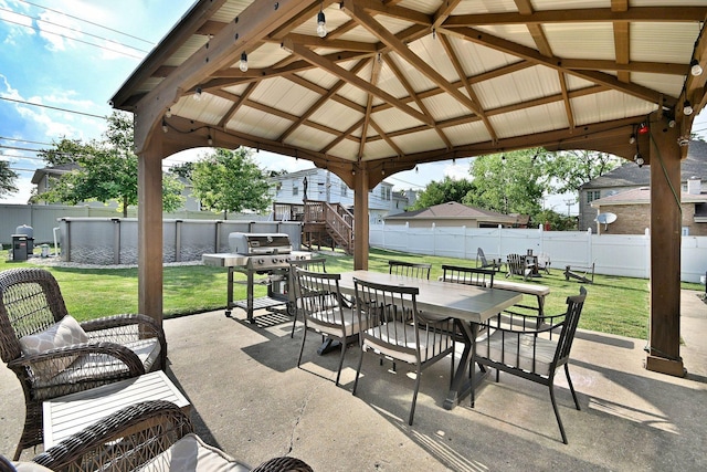 758 N Kenilworth Ave, Elmhurst, IL 60126 - fenced backyard featuring a gazebo, a patio, outdoor dining space, and area for grilling
