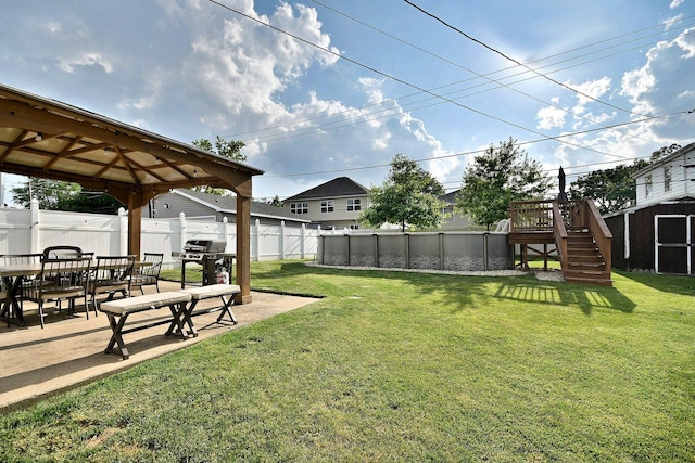 758 N Kenilworth Ave, Elmhurst, IL 60126 - fenced backyard featuring a gazebo, stairs, a wooden deck, a storage shed, and a patio area