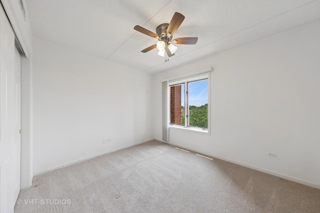 1 N Beacon Pl Unit 502, La Grange, IL 60525 - unfurnished room featuring light carpet and ceiling fan
