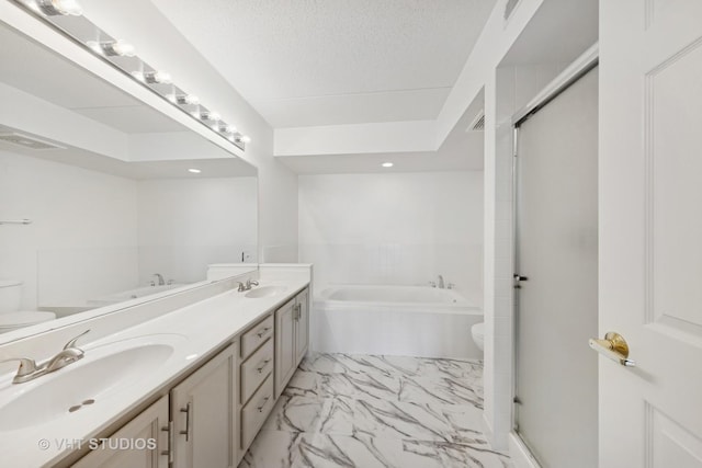 1 N Beacon Pl Unit 502, La Grange, IL 60525 - bathroom with a garden tub, double vanity, marble look tile flooring, a stall shower, and recessed lighting