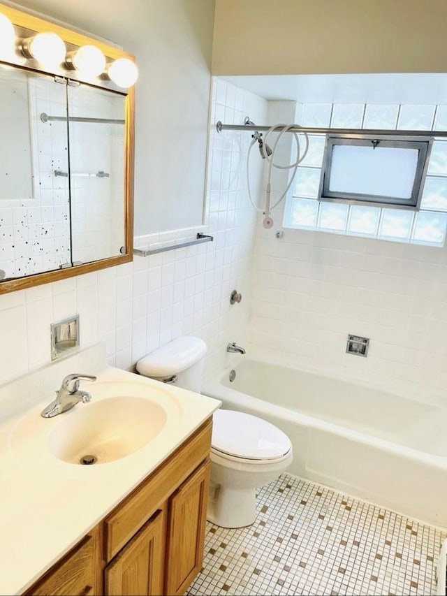 10425 S Hale Ave Unit 3A, Chicago, IL 60643 - full bathroom featuring vanity, tile walls, shower / bath combination, and tile patterned flooring