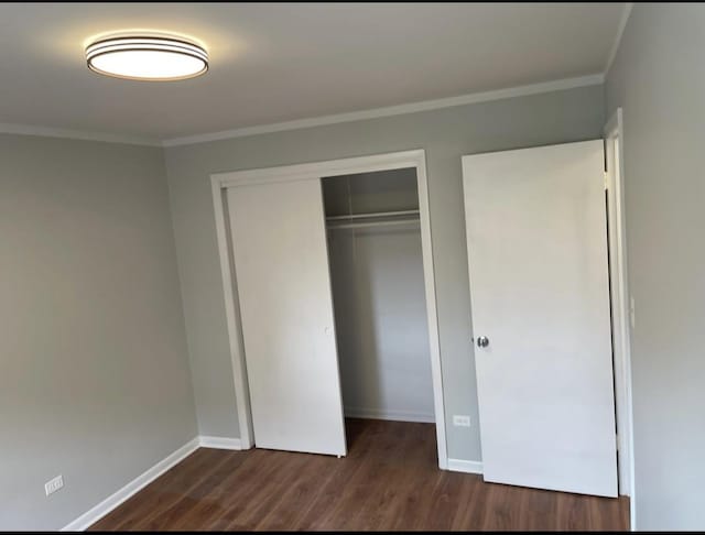 10425 S Hale Ave Unit 3A, Chicago, IL 60643 - unfurnished bedroom with a closet, dark wood-style flooring, and ornamental molding