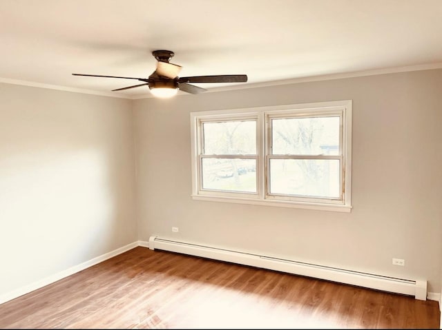 10425 S Hale Ave Unit 3A, Chicago, IL 60643 - spare room featuring a baseboard radiator, wood finished floors, ceiling fan, and crown molding