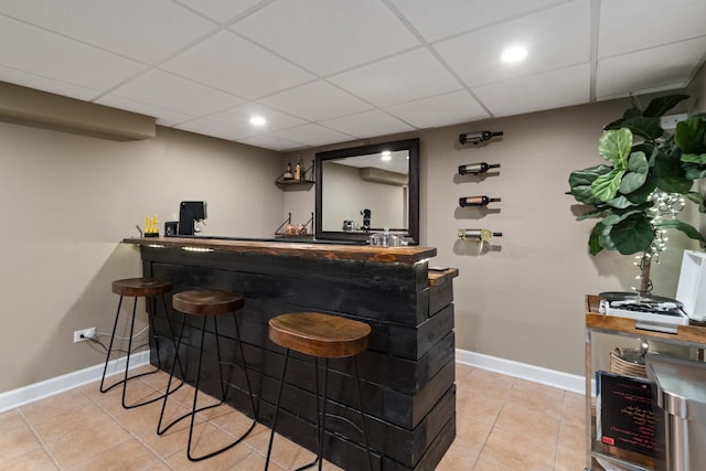 592 E 13th St, Lockport, IL 60441 - indoor wet bar featuring light tile patterned floors, a drop ceiling, and recessed lighting