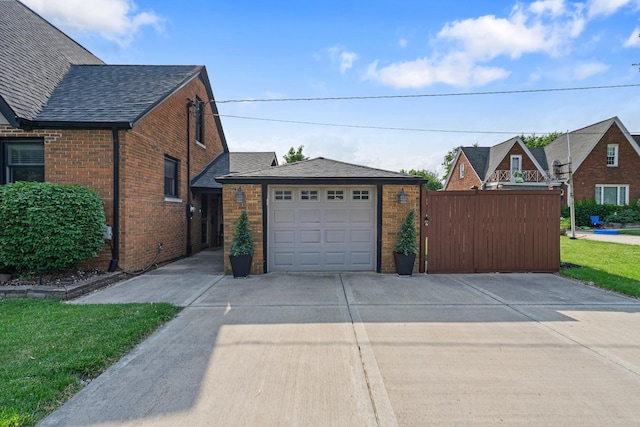 592 E 13th St, Lockport, IL 60441 - view of property exterior with concrete driveway and brick siding