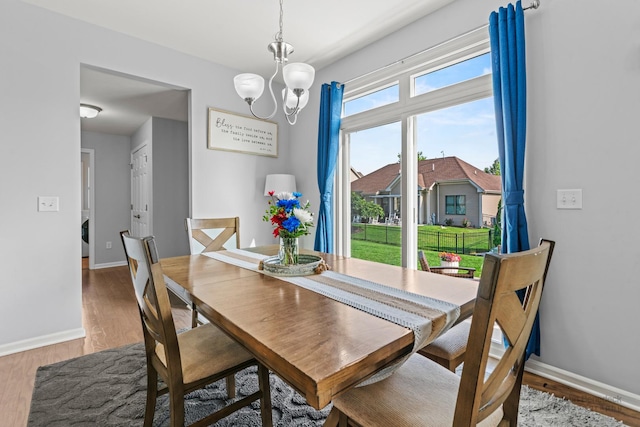 1402 Souders Ave, Elburn, IL 60119 - dining area featuring light wood finished floors and a chandelier