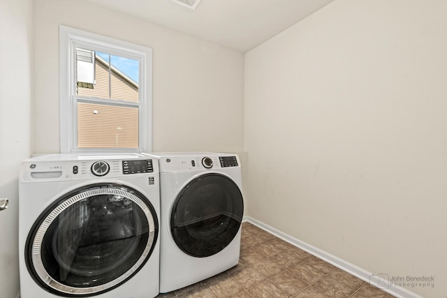 1402 Souders Ave, Elburn, IL 60119 - laundry room with washer and clothes dryer and baseboards