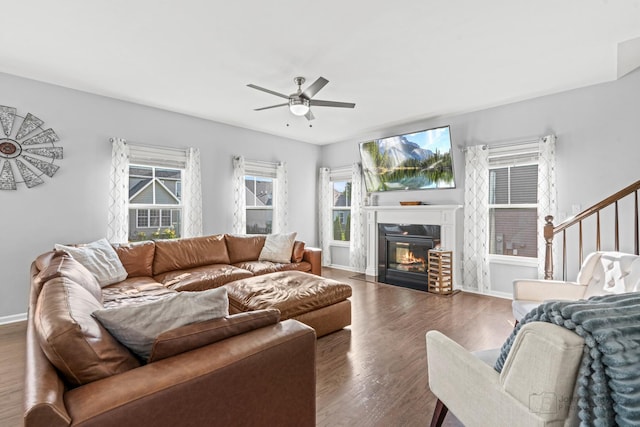 1402 Souders Ave, Elburn, IL 60119 - living room with a ceiling fan, wood finished floors, and a fireplace with flush hearth