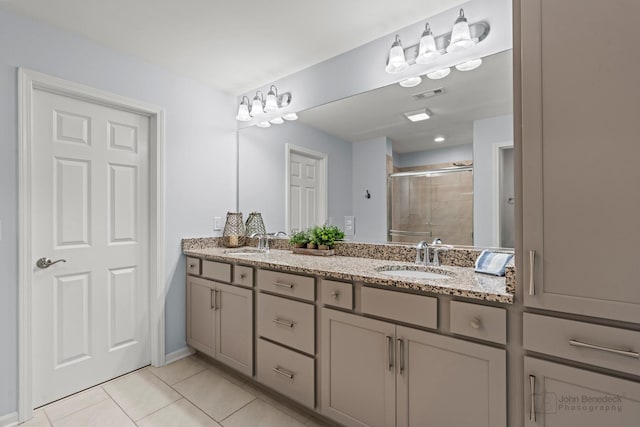 1402 Souders Ave, Elburn, IL 60119 - bathroom featuring a shower stall, double vanity, and tile patterned flooring