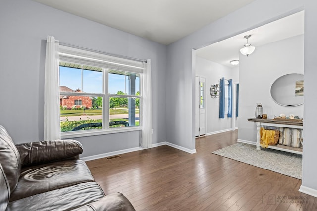 1402 Souders Ave, Elburn, IL 60119 - living area featuring hardwood / wood-style flooring and baseboards