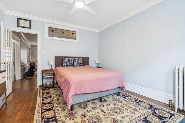 216 N Oak Park Ave Unit 2Aa, Oak Park, IL 60302 - bedroom featuring radiator, ornamental molding, wood finished floors, and a ceiling fan