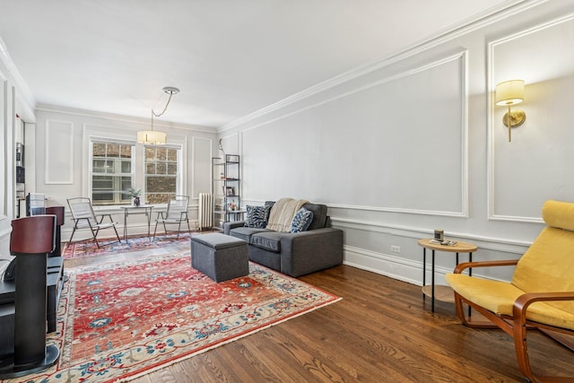 216 N Oak Park Ave Unit 2Aa, Oak Park, IL 60302 - living room with ornamental molding, a decorative wall, and wood finished floors