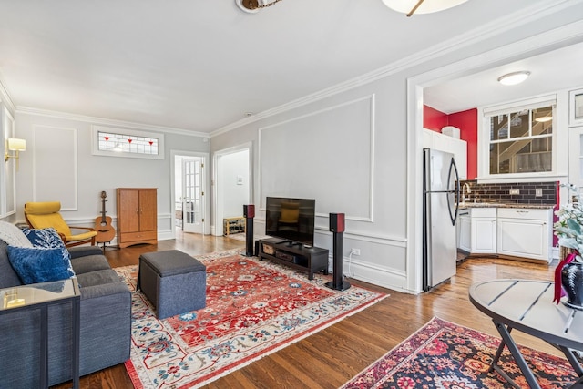 216 N Oak Park Ave Unit 2Aa, Oak Park, IL 60302 - living room featuring light wood finished floors and crown molding