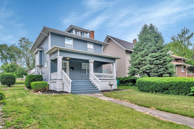 1057 W Park Front St, Joliet, IL 60436 - traditional style home featuring a porch and a front yard