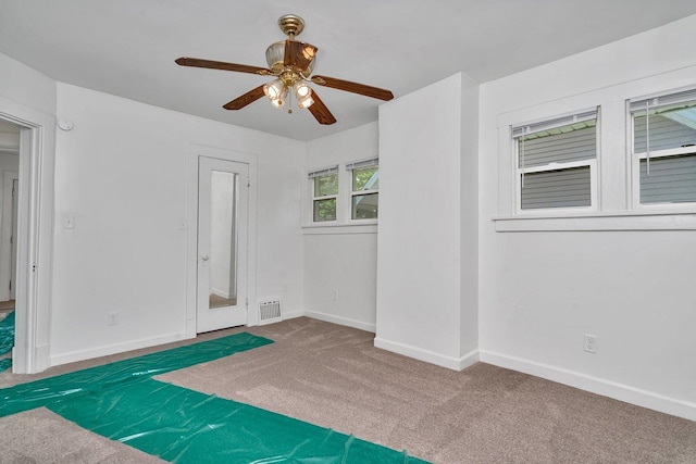 1057 W Park Front St, Joliet, IL 60436 - unfurnished bedroom featuring carpet and a ceiling fan