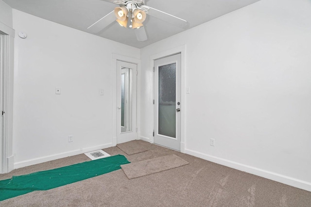 1057 W Park Front St, Joliet, IL 60436 - carpeted empty room featuring a ceiling fan and a smoke detector