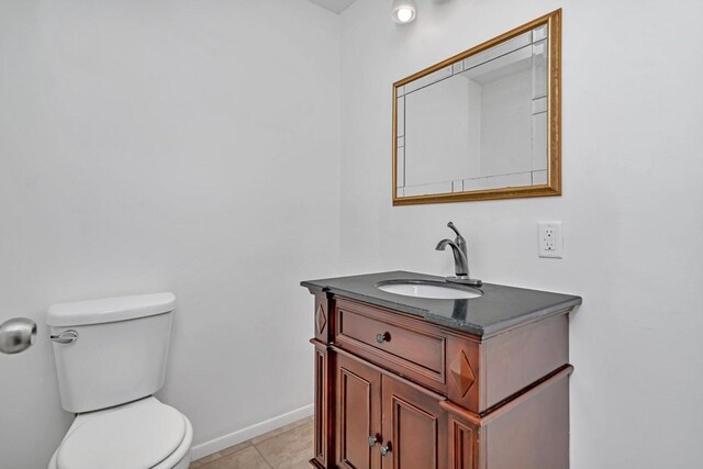 1057 W Park Front St, Joliet, IL 60436 - bathroom featuring vanity and tile patterned floors