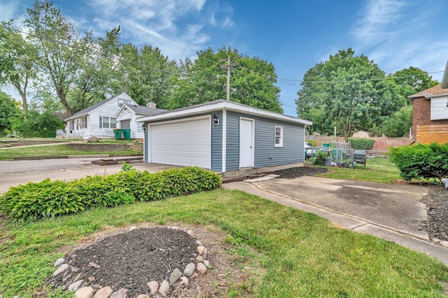 1057 W Park Front St, Joliet, IL 60436 - view of front facade with a garage and an outbuilding