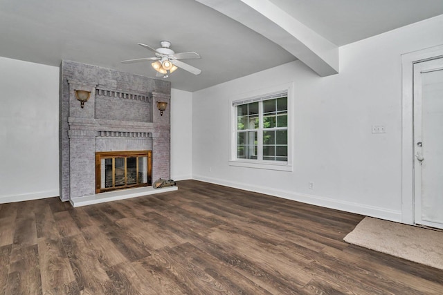 1057 W Park Front St, Joliet, IL 60436 - unfurnished living room featuring ceiling fan, a fireplace, and wood finished floors