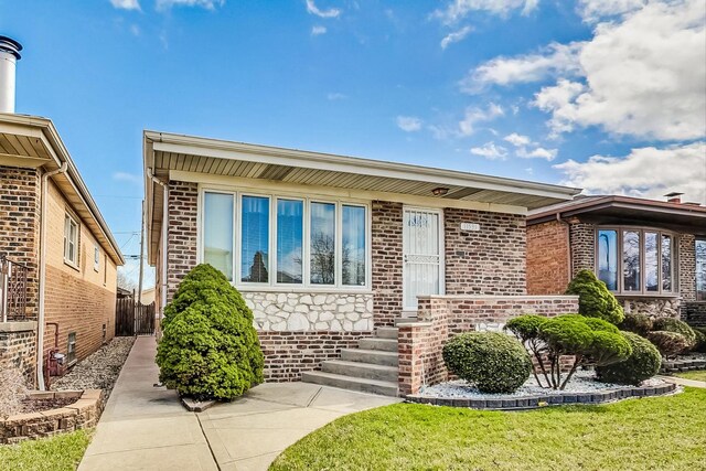11531 S S Ave J, Chicago, IL 60617 - view of front of home with brick siding and stone siding