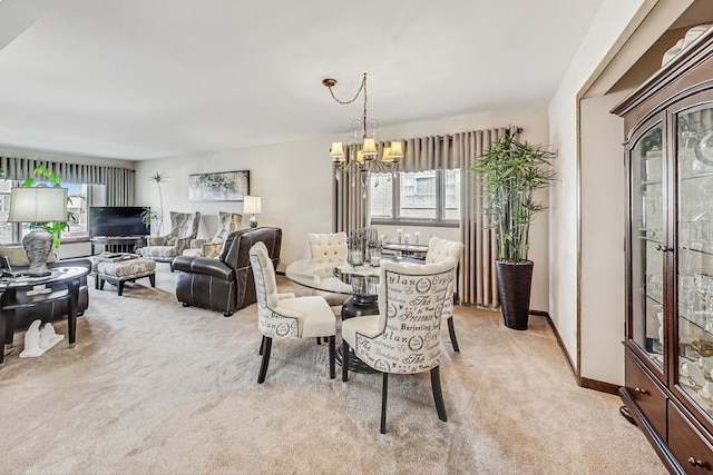 11531 S S Ave J, Chicago, IL 60617 - dining room featuring light colored carpet and a chandelier