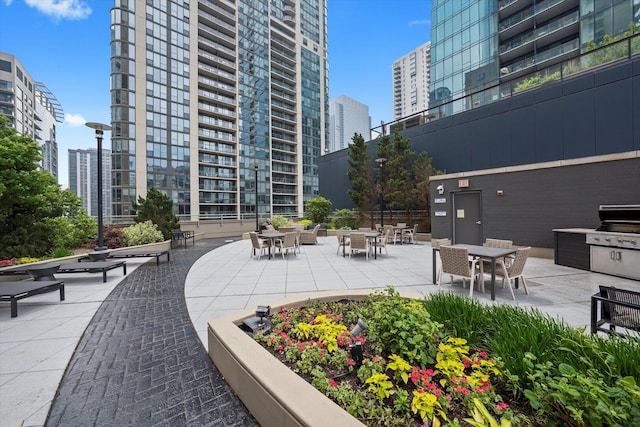 420 E Waterside Dr Unit 407, Chicago, IL 60601 - view of property's community with a view of city and a patio