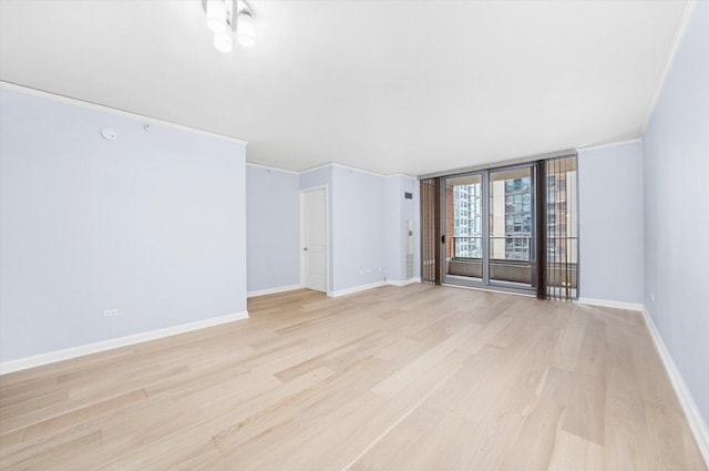 420 E Waterside Dr Unit 407, Chicago, IL 60601 - unfurnished room with light wood-style floors and crown molding