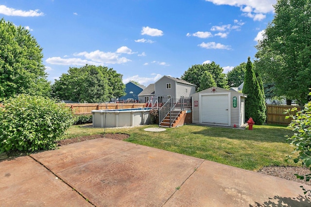 1239 Angeline Dr, South Elgin, IL 60177 - fenced backyard with a storage unit and a patio